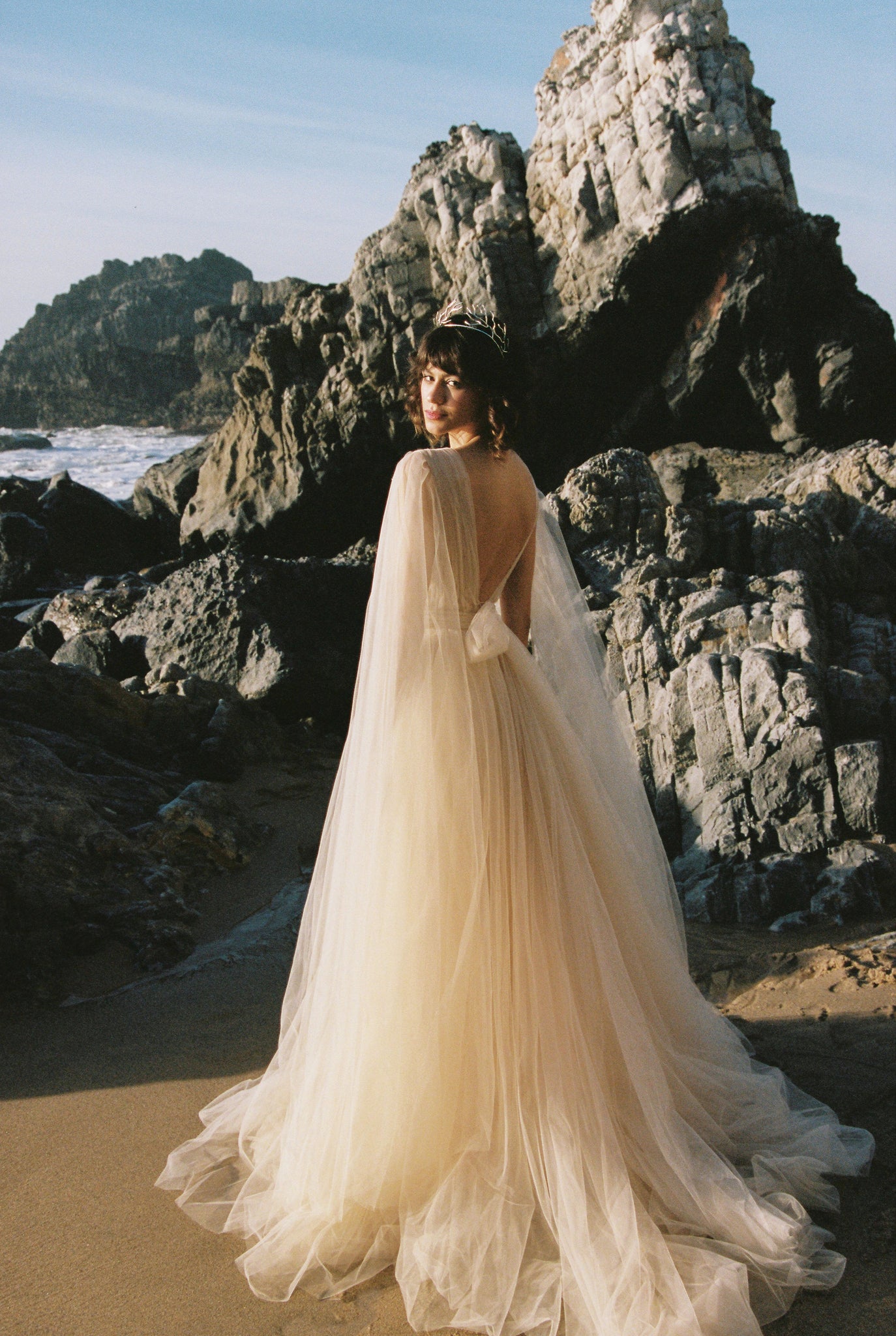 A-line beaded tulle wedding dress with cape sleeves photo 1