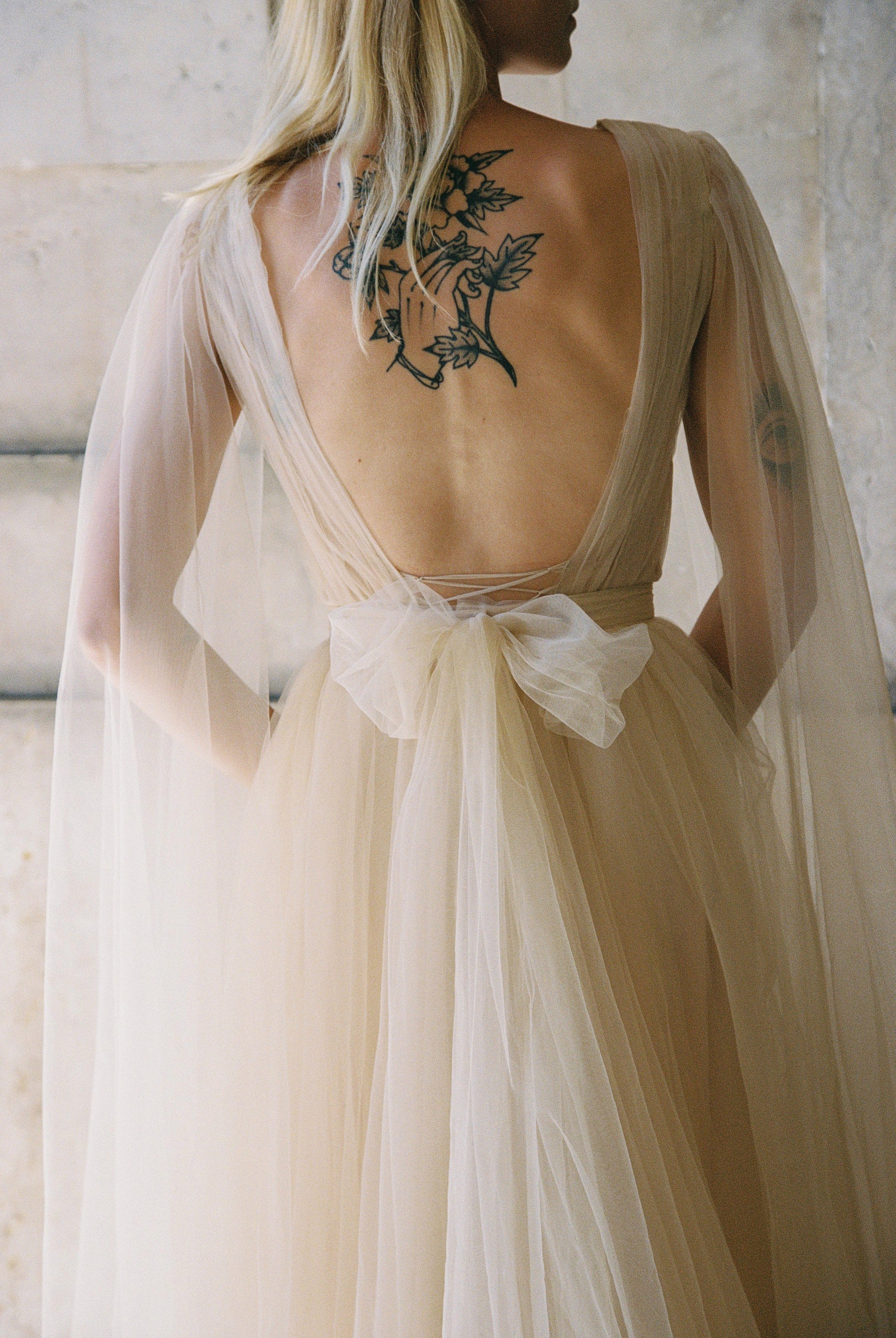 Beaded ball gown wedding dress with cape sleeves 12 US / champagne