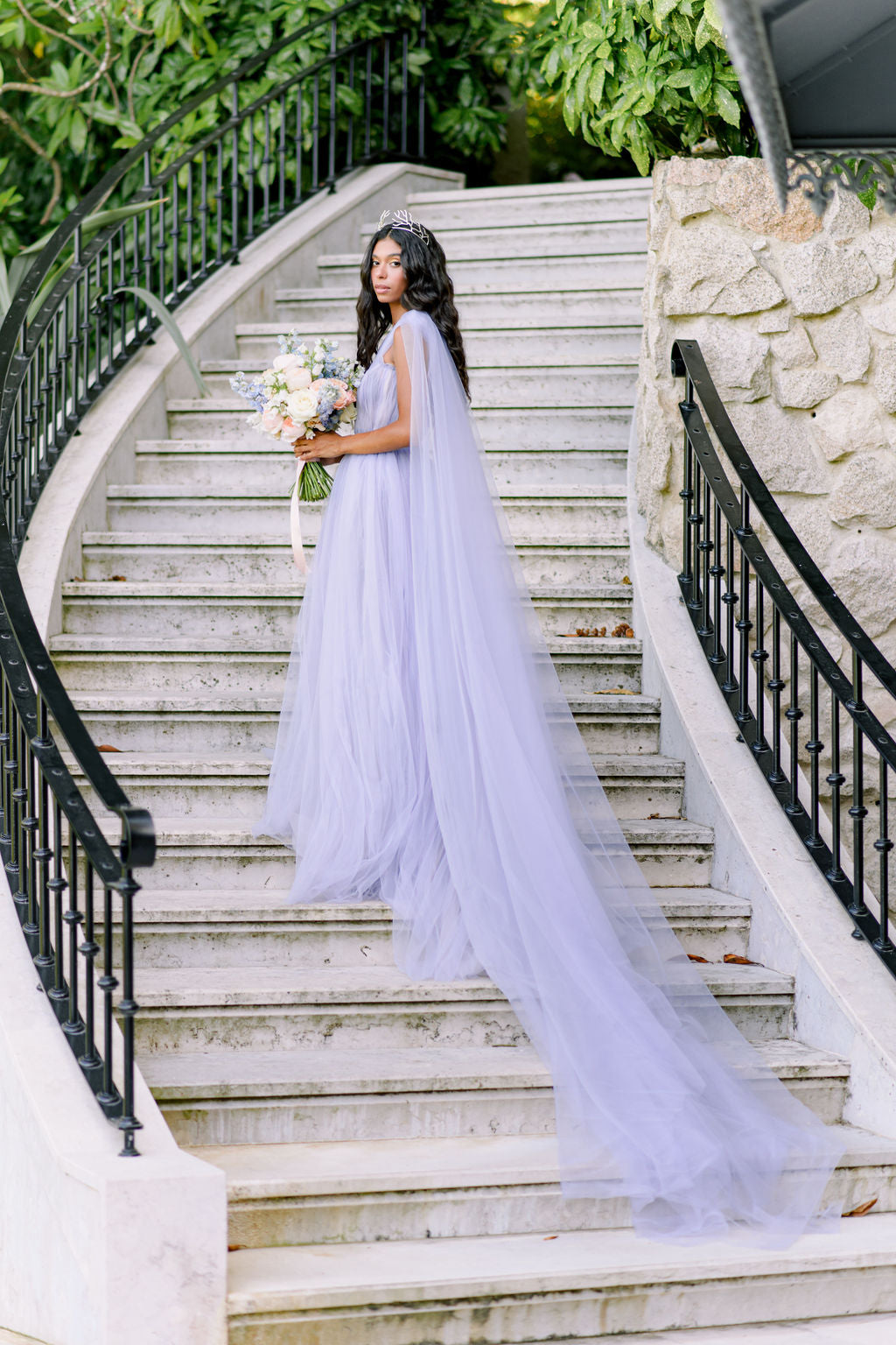 Bridal tulle gown with side cape photo 1