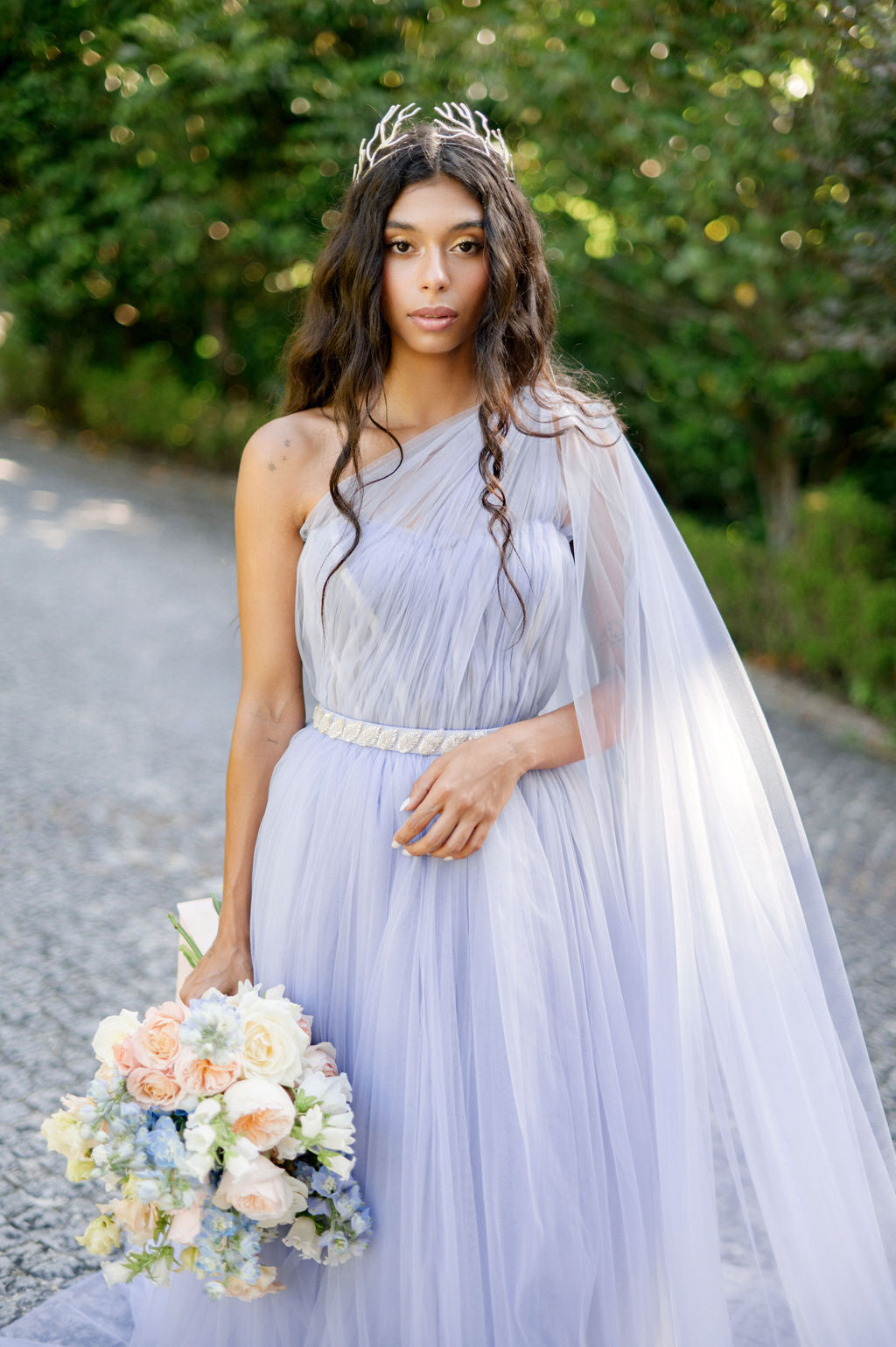 Bridal tulle gown with side cape photo 7