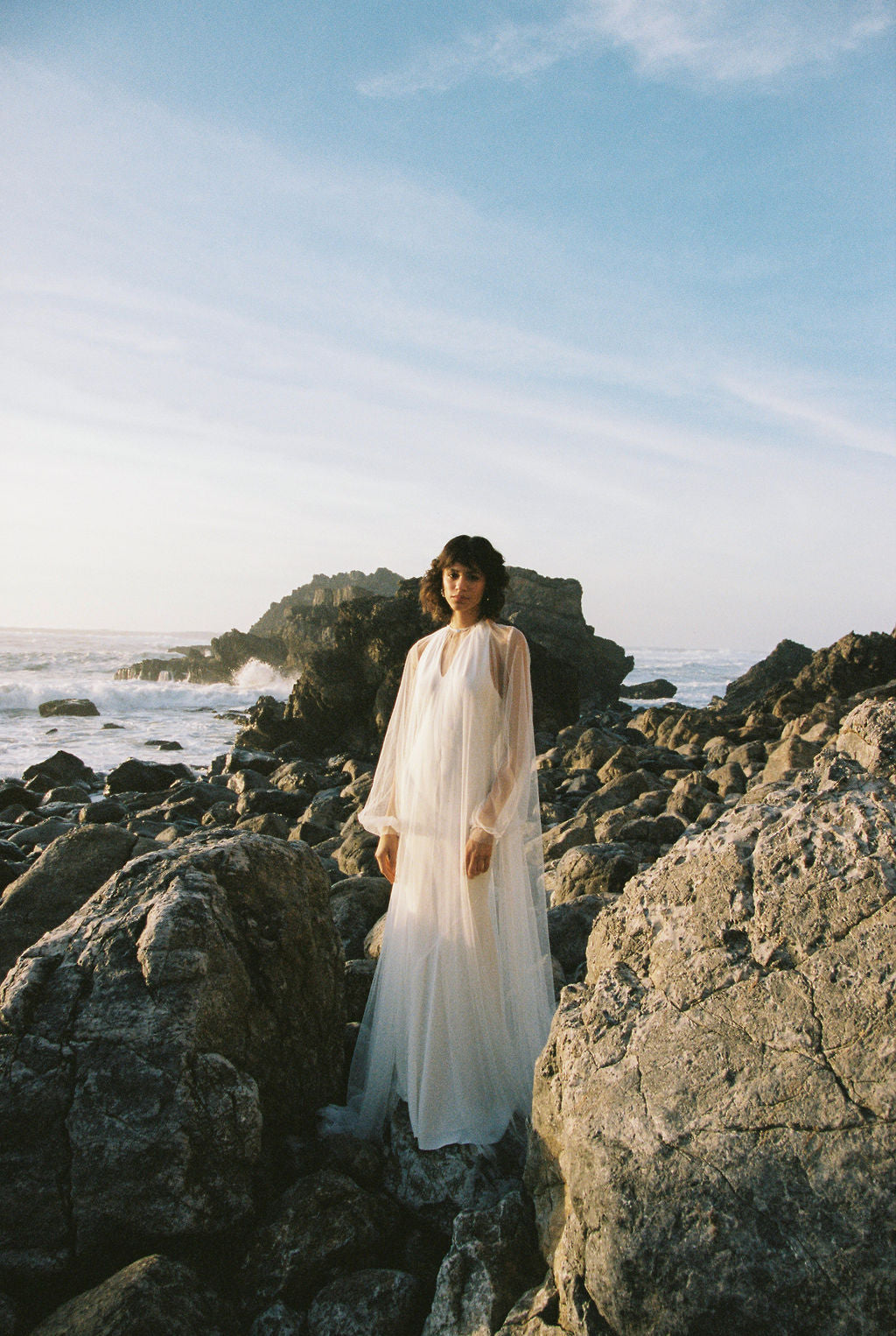 Bridal cape with sleeves