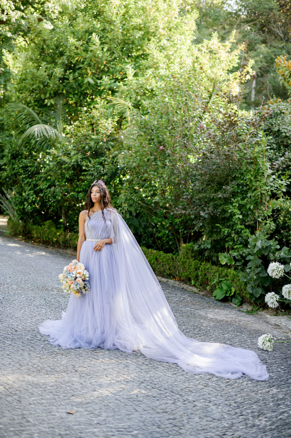 Bridal tulle gown with side cape photo 8