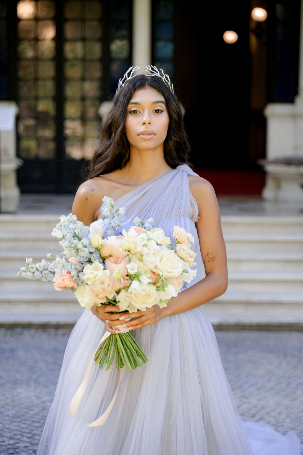 Bridal tulle gown with side cape photo 5