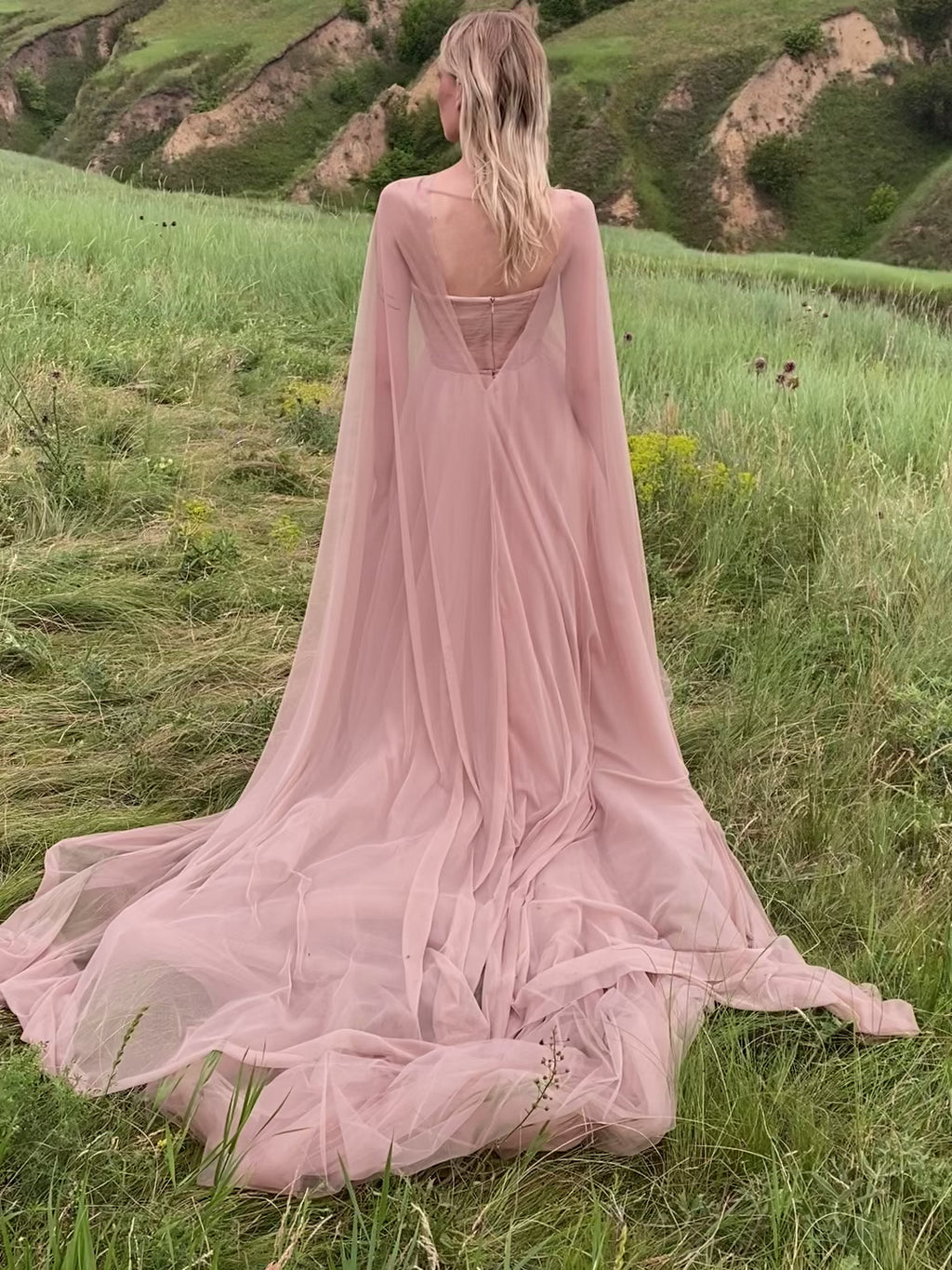 Transparent wedding cape with an open back and V-neck front video