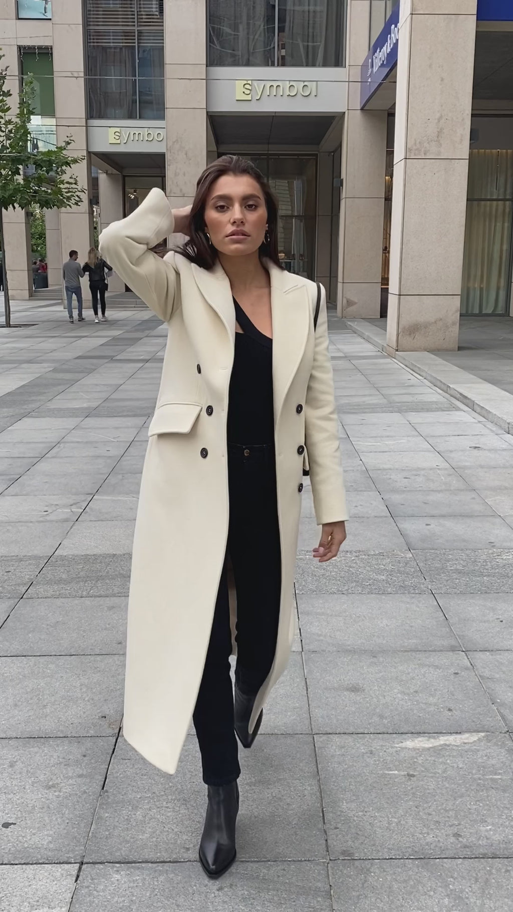 Wool tapered coat in ivory video