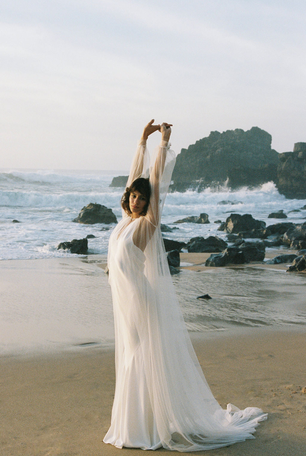 Bridal cape with sleeves