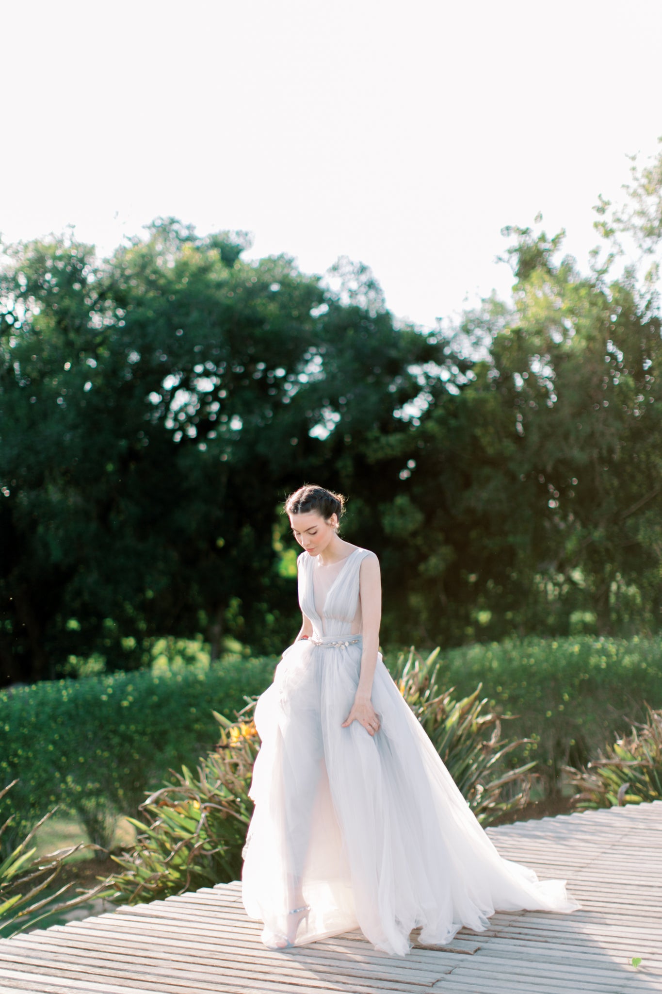 Long full wedding dress with an open back photo 5