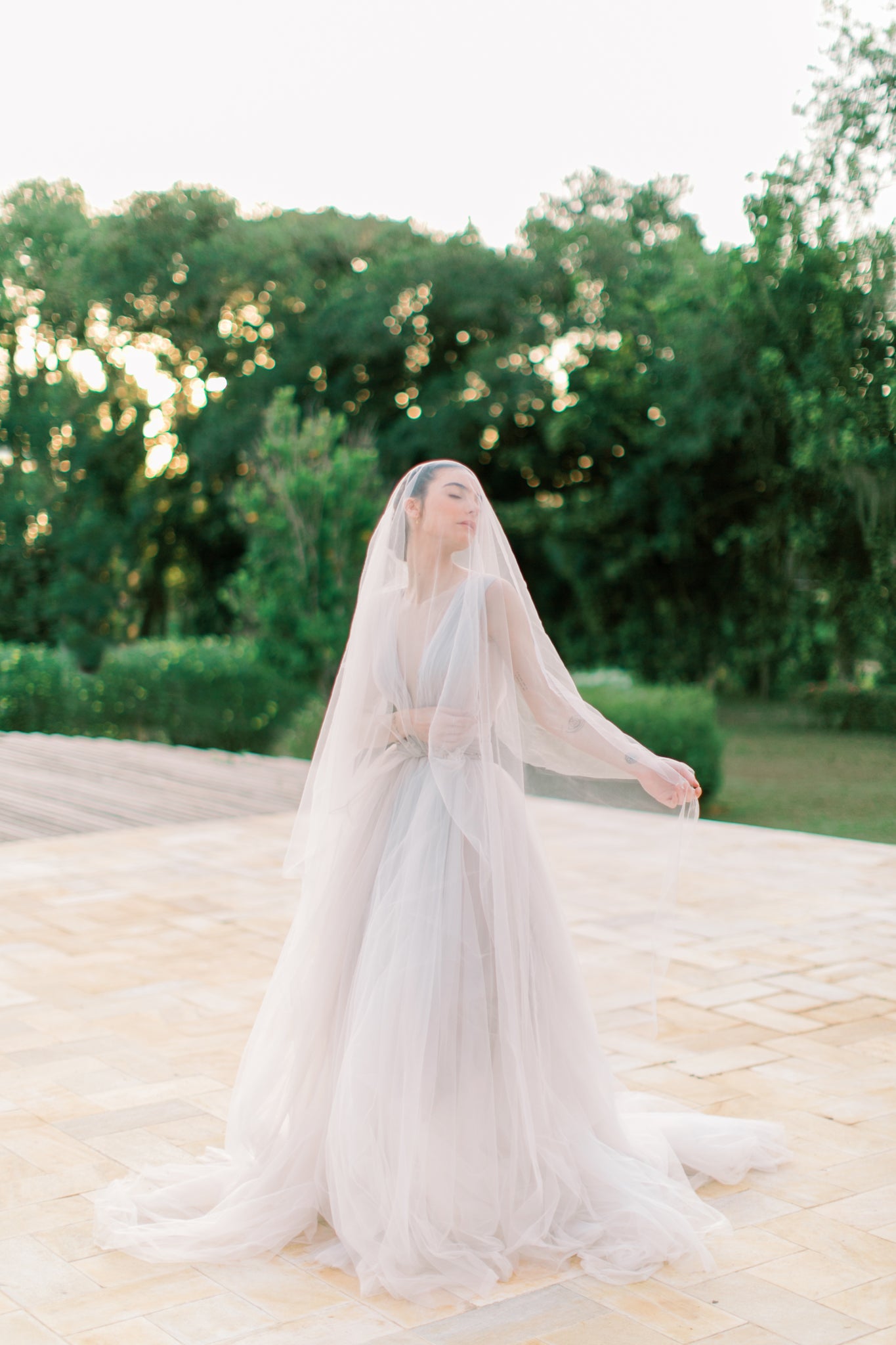 Long full wedding dress with an open back photo 6